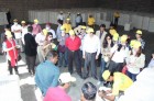 Chinese delegates checking quality of raw cotton